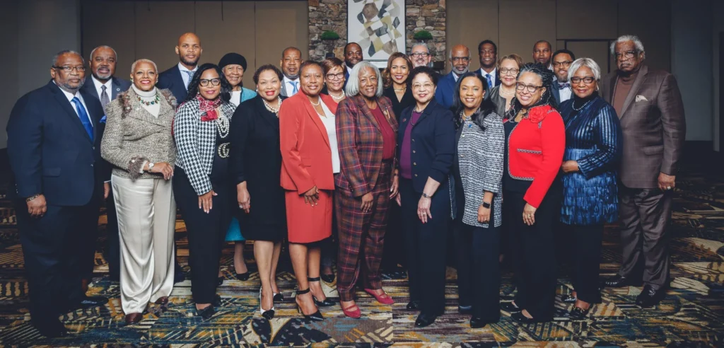 Group photo of HBCU leaders and stakeholders at the UNCF North Carolina Presidents Summit, standing together in formal business attire