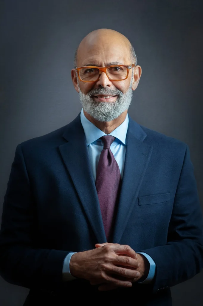 Professional headshot of Doctor Lomax